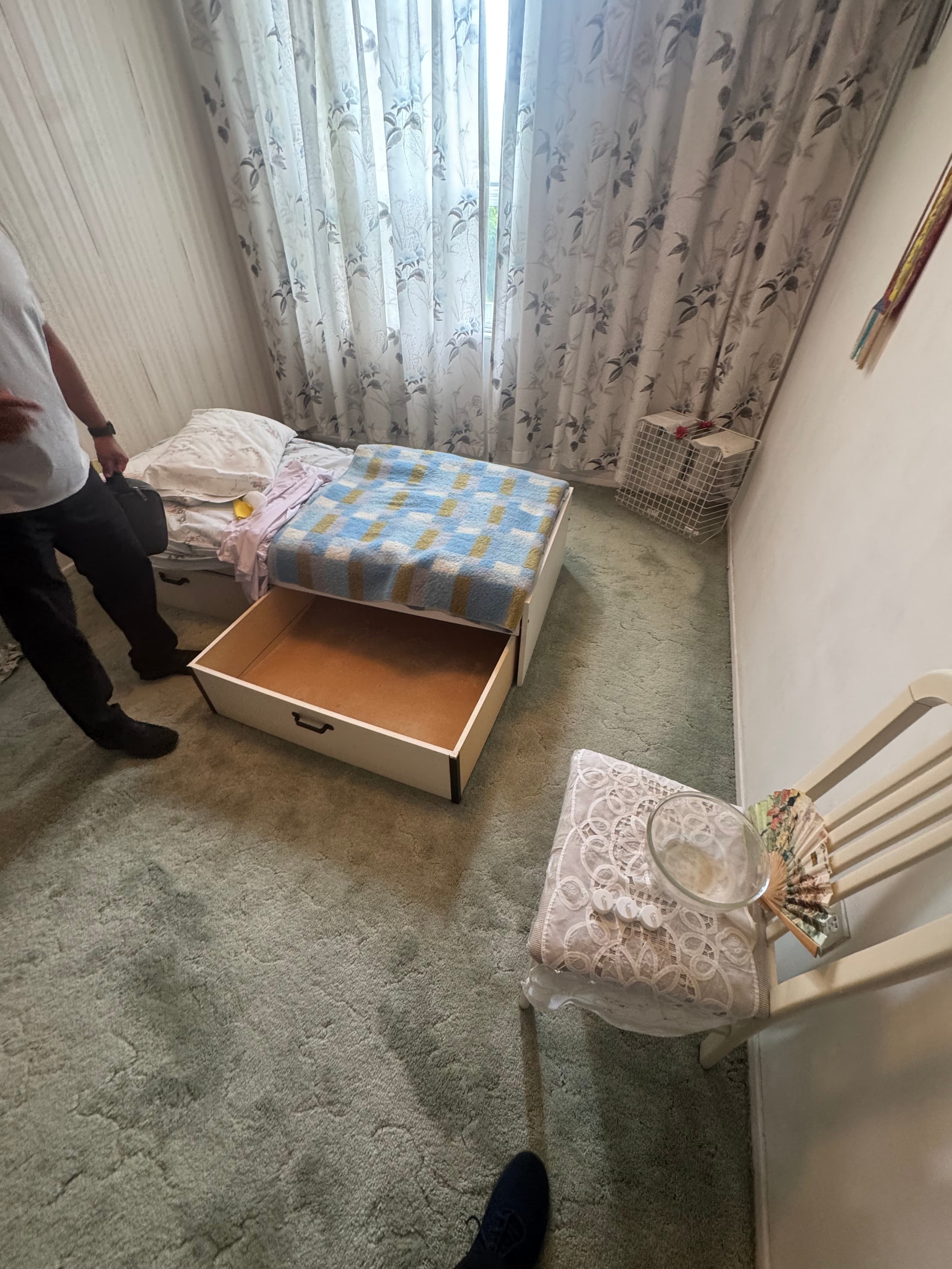 Estate cleanout Brampton — packed living room before junk removal